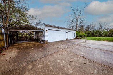 Carport and 3 car garage