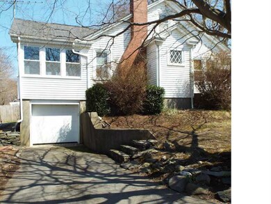 Parking Lot/Garage. driveway side of house