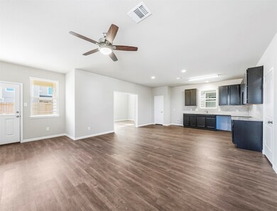 : Image depicts a model home of a similar layout to the home available for purchase.