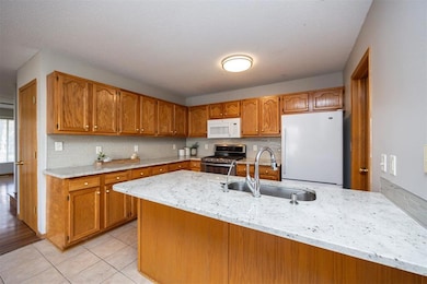 Kitchen with island seating, updated countertops a