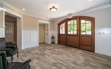 Beautifully updated entryway to lobby of building