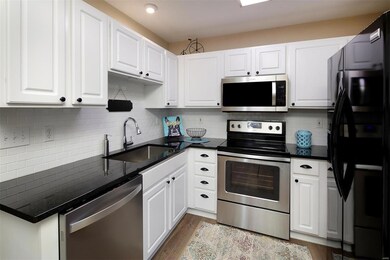 Delightful is this updated kitchen with newer gran