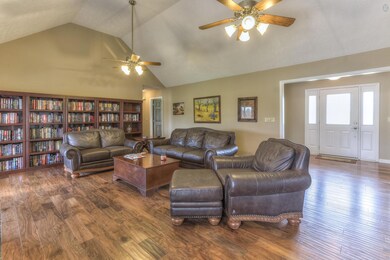 You can see the front entrance and the foyer to the far right of the picture.