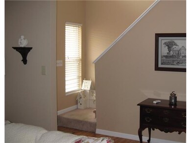 Other. Here s a view from the living room of the entryway and the stairs going up to the bedrooms.