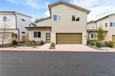 View of front of home with an attached garage, dr