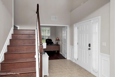Staircase off foyer
