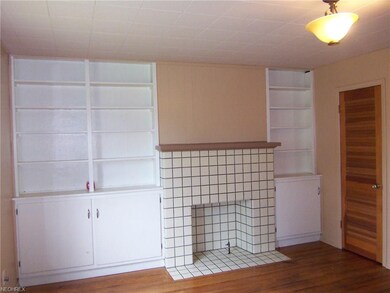 Built ins and a decorative fireplace in the Master