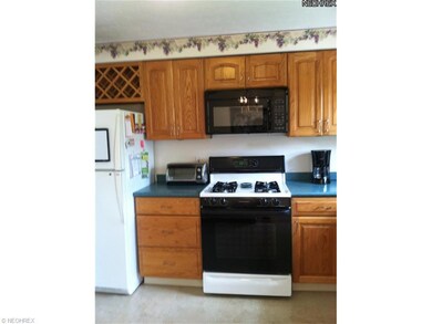 Updated cabinets, countertops and flooring in Kitc