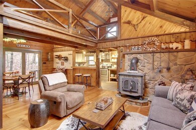 Open Concept Living room with Wood Stove.