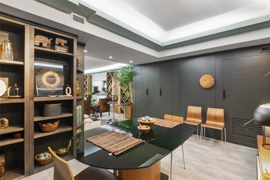 Another view of the dining area, custom cabinetry,
