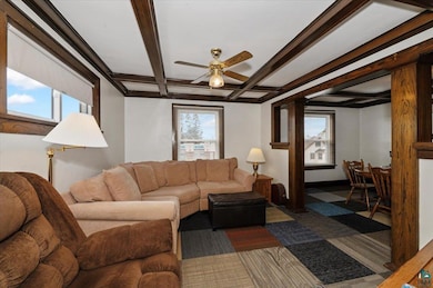 Living area with beamed ceiling, coffered ceiling,