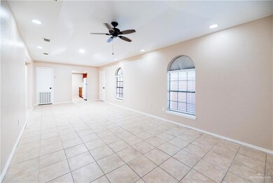 View of the living room and entry to the kitchen.