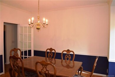 Dining room also has hardwood flooring.
