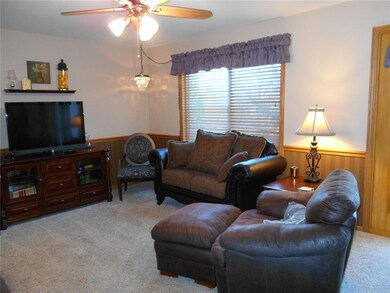 Family Room off kitchen with access to deck.