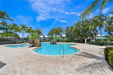 Community pool with a patio area