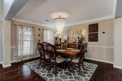 Dining area featuring an inviting chandelier, crow