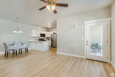 Great room with door to covered deck.
