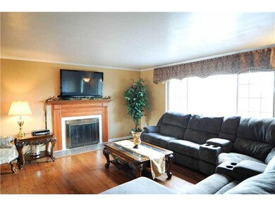 Living Room. Gleaming hardwood floors on the main 