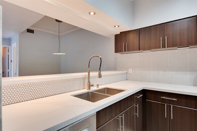 New cabinets, Quartz countertops, tile backsplash
