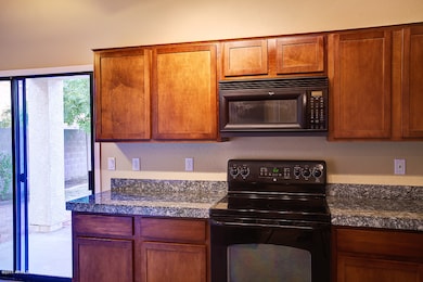 Granite counters and Gorgeous cabinets