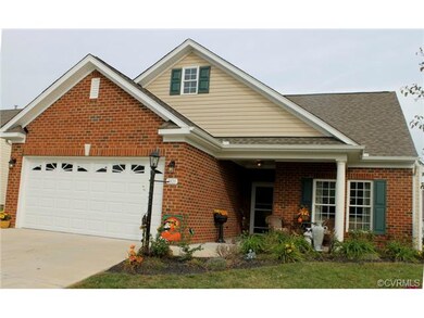 BEAUTIFUL BRICK FRONT OFFERING WIDE CONCRETE PARKI