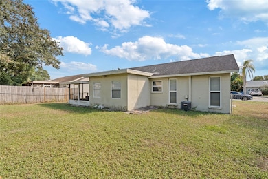 The back yard is flat, level and fenced in.