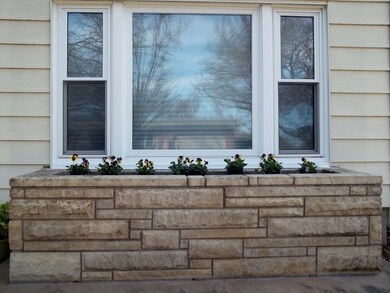 Dress up the large window with lots of colorful fl