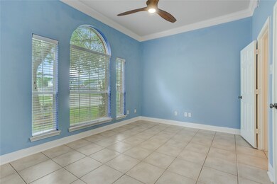 Formal dining with plentiful natural light.