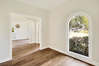 Empty room featuring hardwood / wood-style floors