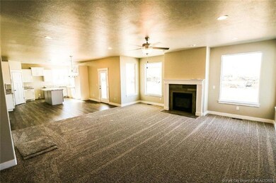 LARGE MAIN FLOOR FAMILY ROOM WITH FIREPL