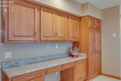 So many kitchen cabinets and wonderful counter top space!