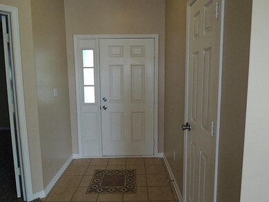 Entry. Great tiled floor and closet for storage