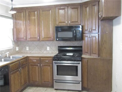Kitchen View with gas stove.