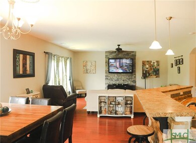 Open floor plan with french doors leading out the 