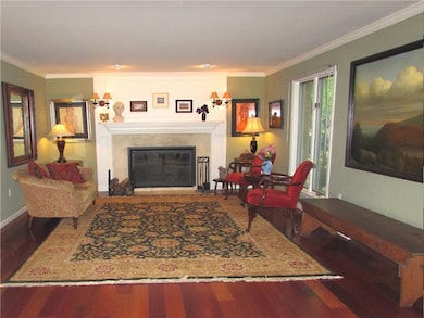Through a French Door, off the Entry, is the Huge 