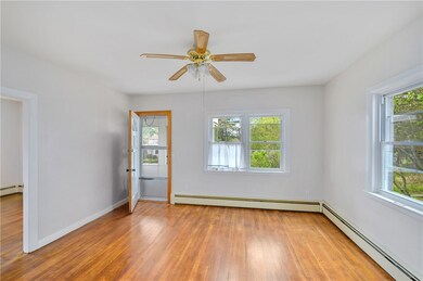 First floor living room, looking out onto the sun