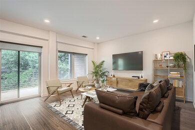 Living area with wood finished floors and recesse