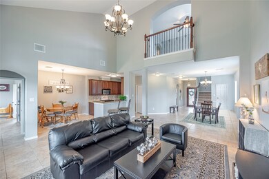 This is an easy space to relax in! The Kitchen & family space flow flawlessly while still offering that sense of separation of space! Neutral designer colors add that touch of airiness to the space!