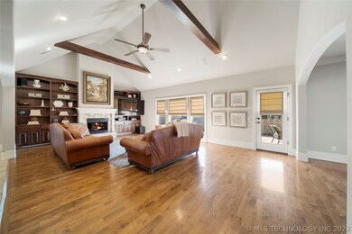Wood beams in the family room which features addit