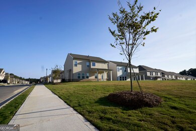 305 Sterling Creek Way, Loganville, GA 30052 - photo 7