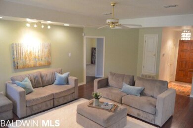 Hardwoods in the main living areas and split brick pavers in the foyer.