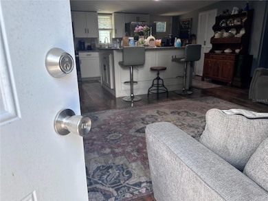 Upon entering the home.