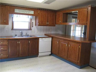 Kitchen. The kitchen has a skylight and the window
