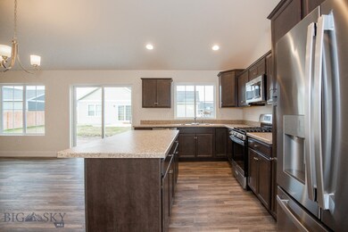 Kitchen rendering showing large island (similar fl