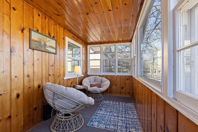 Enclosed front porch.