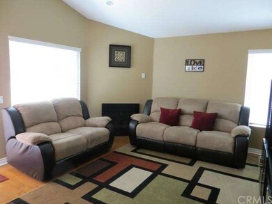 Large and inviting living room with vaulted ceilin