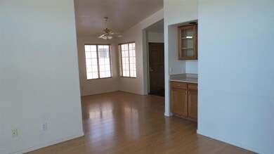 FORMAL DINING ROOM AS YOU ENTER FROM THE FRONT DOOR