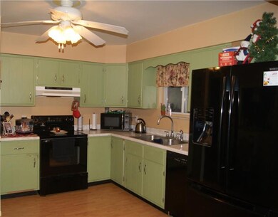 Open Concept Kitchen with view of dining and livin