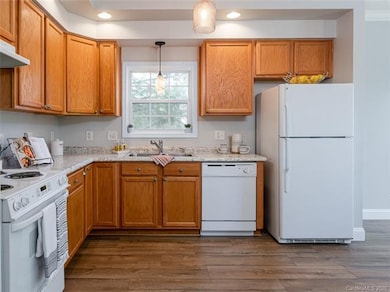 Kitchen in 35 Wilmington Street located in West Asheville. This is a 3 Bedroom, 2 Bathroom, 1088 SQ FT home. Fresh paint, new countertops and flooring just installed, this home is move-in ready!