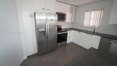 1351 NE Miami Gardens Dr unit 915E, Miami, FL 33179 - photo 2